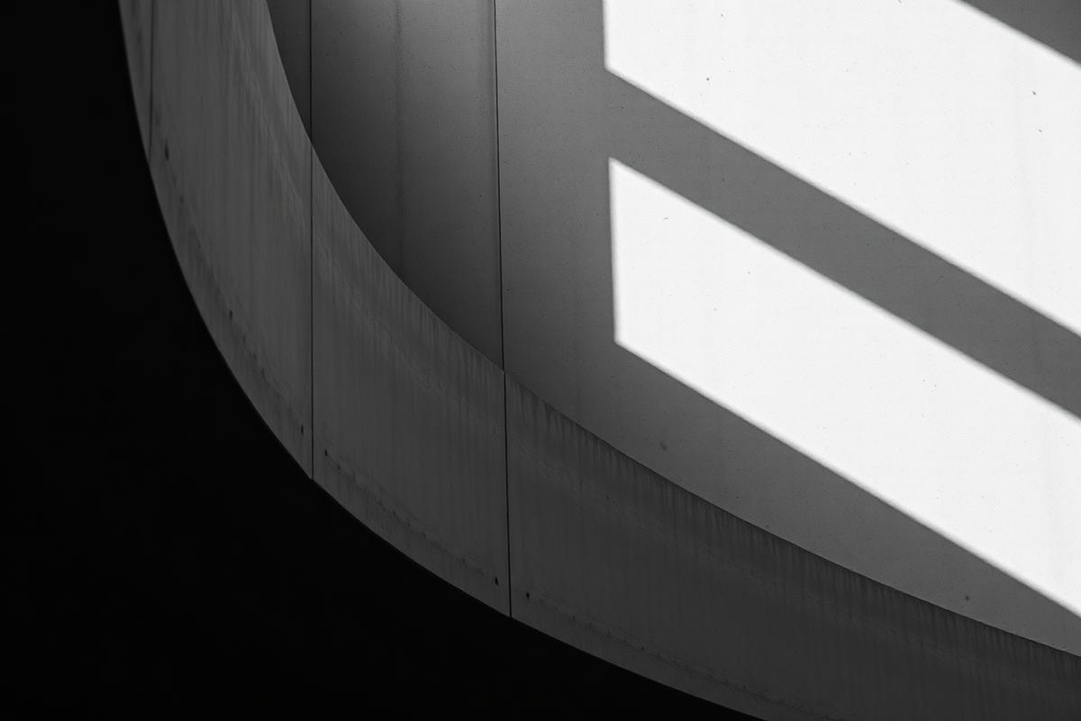 Minimalist architectural detail of concrete and light shadow